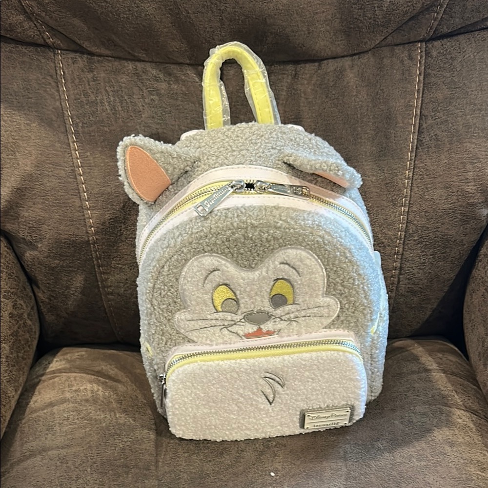 Disney’s lounge fly Figaro from Pinocchio backpack double zippered front